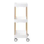 Πλάγια όψη του τροχήλατου βοηθητικού τραπεζιού 127 με λευκά ράφια και χάλκινο σκελετό.