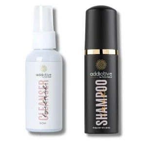 Το λευκό σπρέι Eyelash Cleanser και το μαύρο Lash Shampoo της Addictive by Menia Nalbandi δίπλα δίπλα.