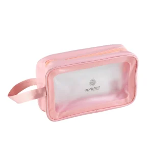 Κομψό ροζ νεσεσέρ ομορφιάς Addictive Travel Case με διάφανη μπροστινή όψη και πλευρικό χερούλι.