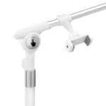 Κοντινή λήψη της κεντρικής άρθρωσης της λευκής λάμπας Glow Arche με τοποθετημένη τη βάση κινητού τηλεφώνου.