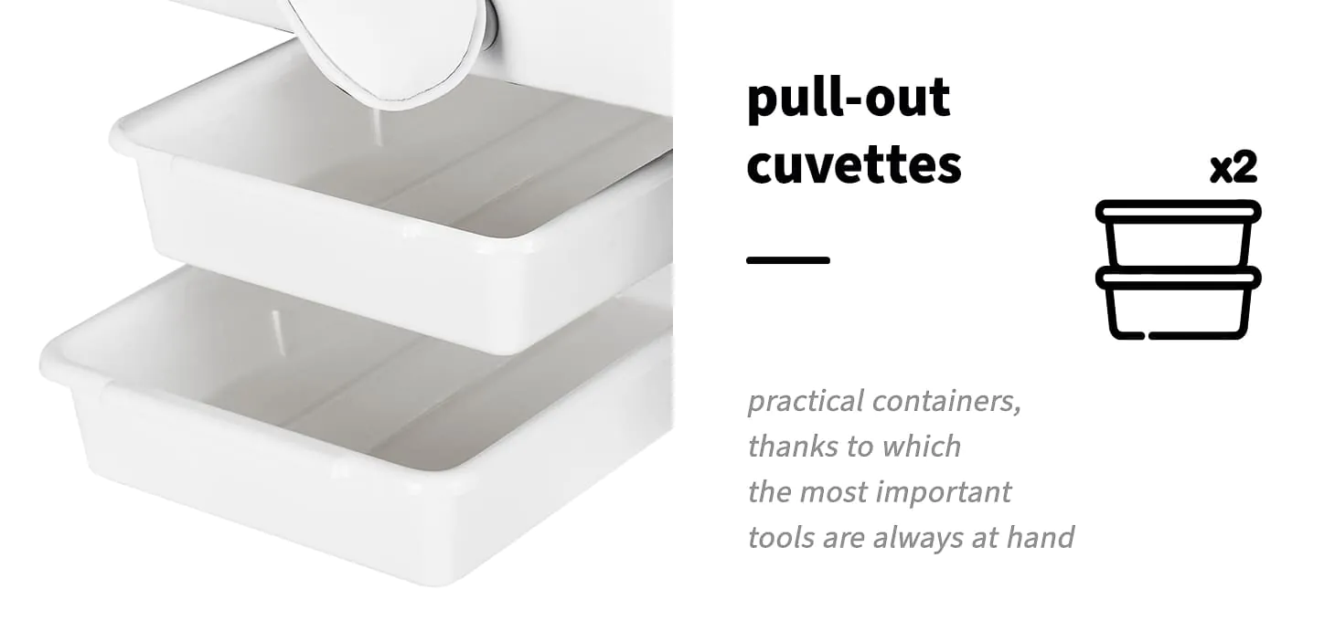 Κοντινή λήψη της λευκής πολυθρόνας αισθητικής Sillon που δείχνει τα δύο λευκά συρτάρια αποθήκευσης και τους μοχλούς ρύθμισης.